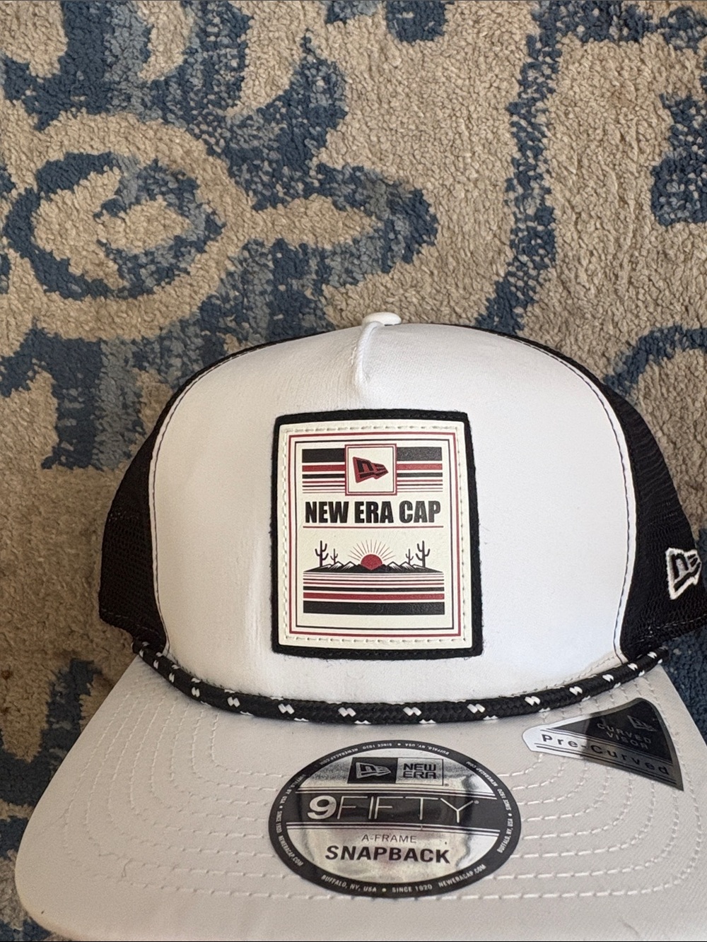New Era White and Black Patch Front Trucker Snapback Cap